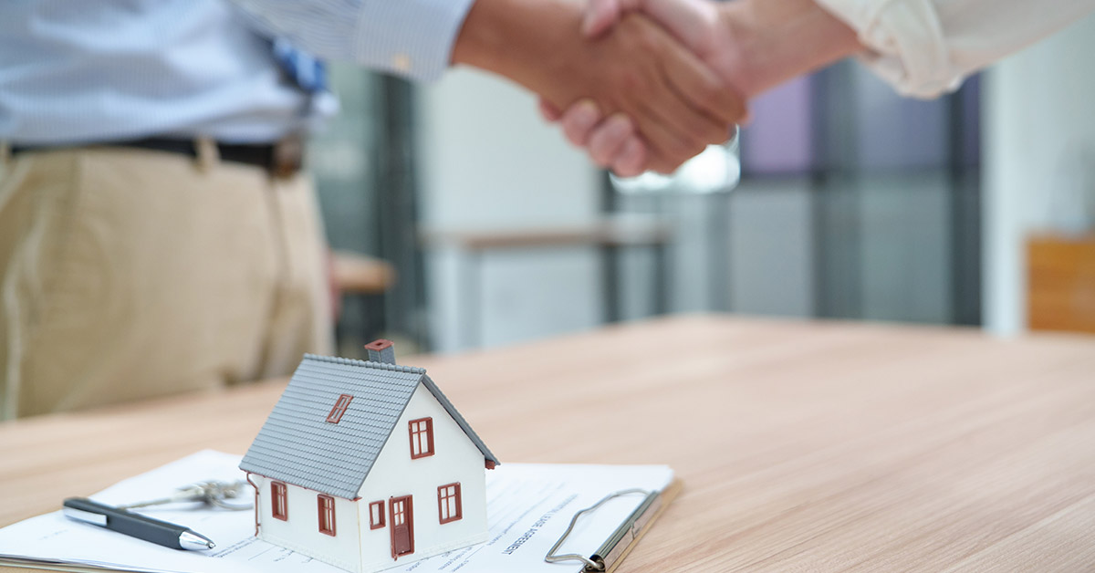 Homeowner reviewing closing costs before selling a house
